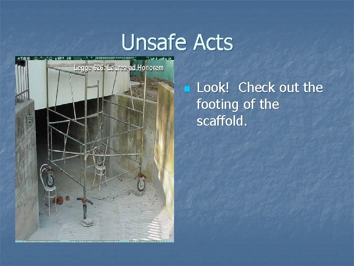 Unsafe Acts n Look! Check out the footing of the scaffold. 