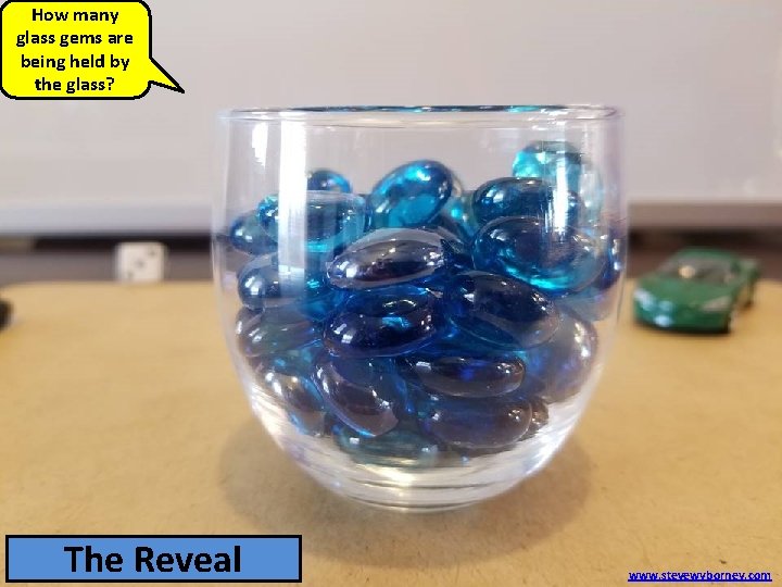 How many glass gems are being held by the glass? 54 The glass Reveal
