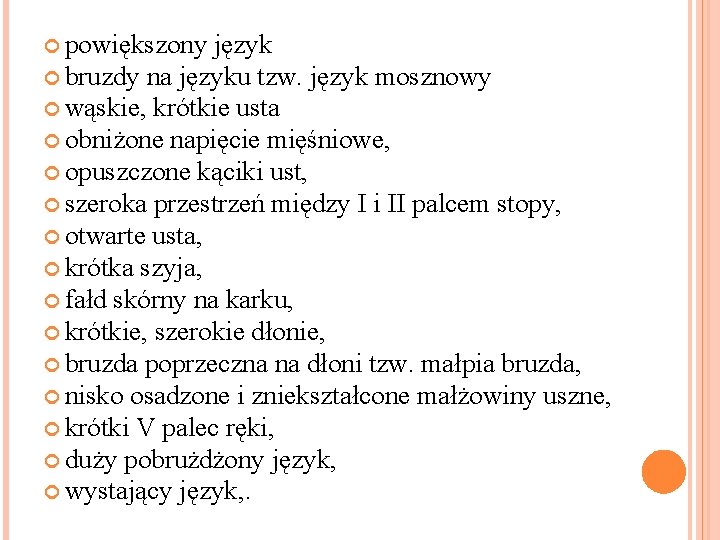  powiększony język bruzdy na języku tzw. język mosznowy wąskie, krótkie usta obniżone napięcie