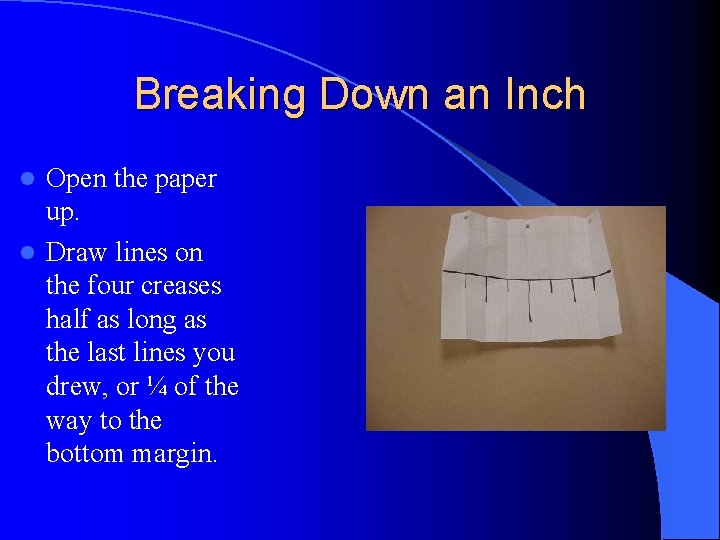 Breaking Down an Inch Open the paper up. l Draw lines on the four