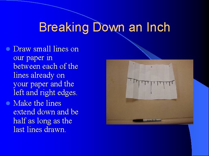 Breaking Down an Inch Draw small lines on our paper in between each of