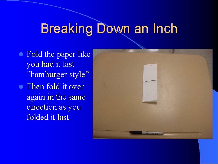 Breaking Down an Inch Fold the paper like you had it last “hamburger style”.