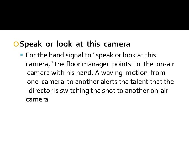  Speak or look at this camera For the hand signal to “speak or