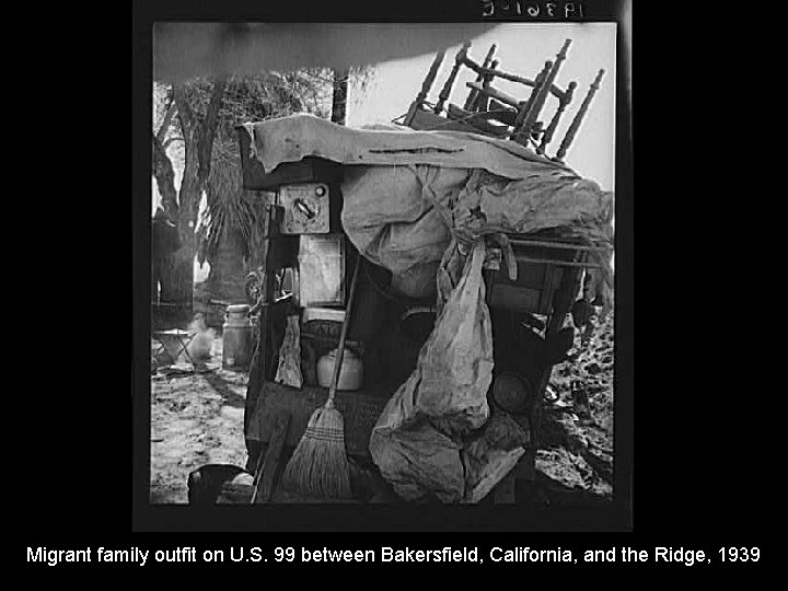 Migrant family outfit on U. S. 99 between Bakersfield, California, and the Ridge, 1939