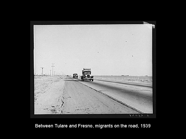 Between Tulare and Fresno, migrants on the road, 1939 