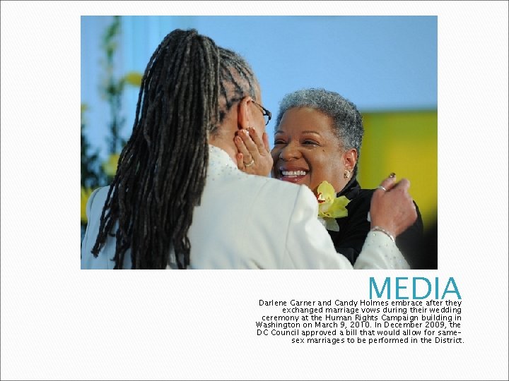 MEDIA Darlene Garner and Candy Holmes embrace after they exchanged marriage vows during their