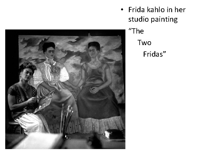  • Frida kahlo in her studio painting • “The • Two • Fridas”