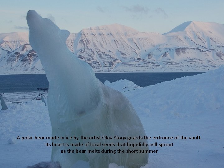 A polar bear made in ice by the artist Olav Storø guards the entrance