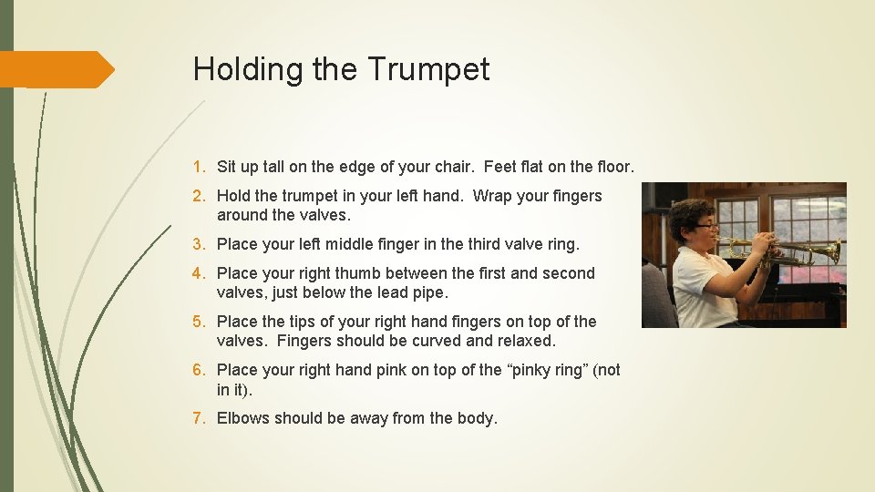 Holding the Trumpet 1. Sit up tall on the edge of your chair. Feet