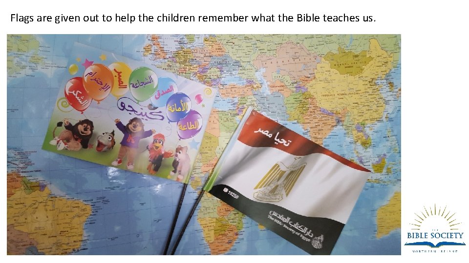 Flags are given out to help the children remember what the Bible teaches us.