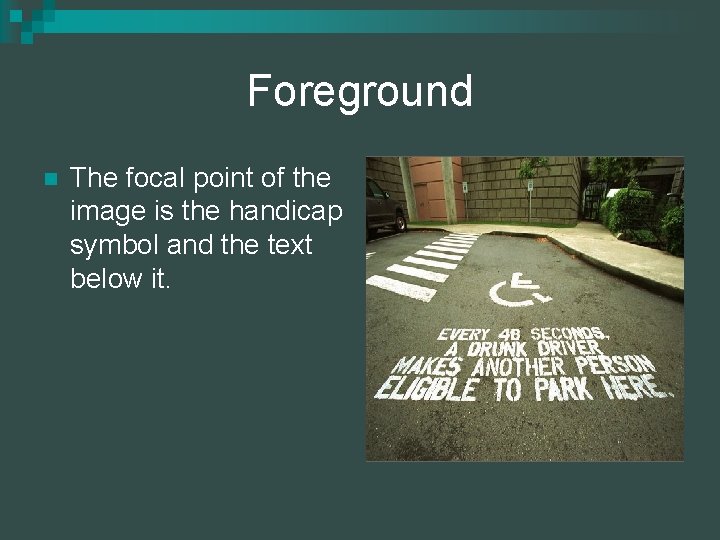 Foreground n The focal point of the image is the handicap symbol and the