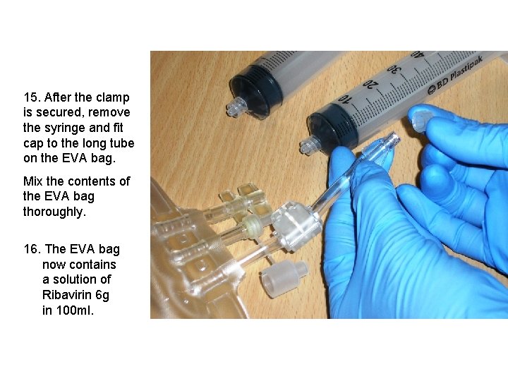 15. After the clamp is secured, remove the syringe and fit cap to the