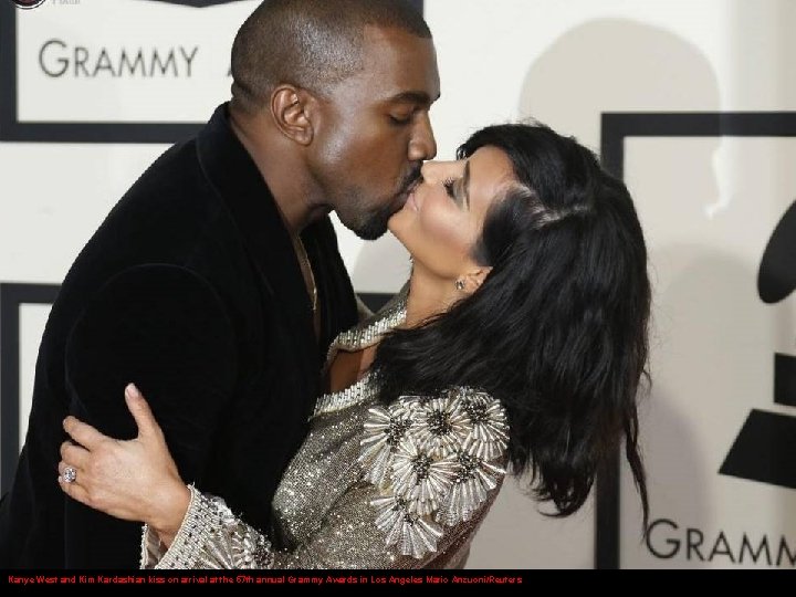 Kanye West and Kim Kardashian kiss on arrival at the 57 th annual Grammy