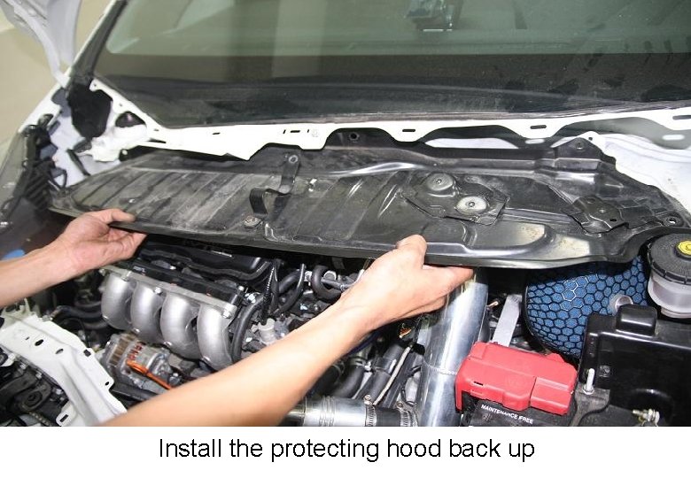 Install the protecting hood back up 