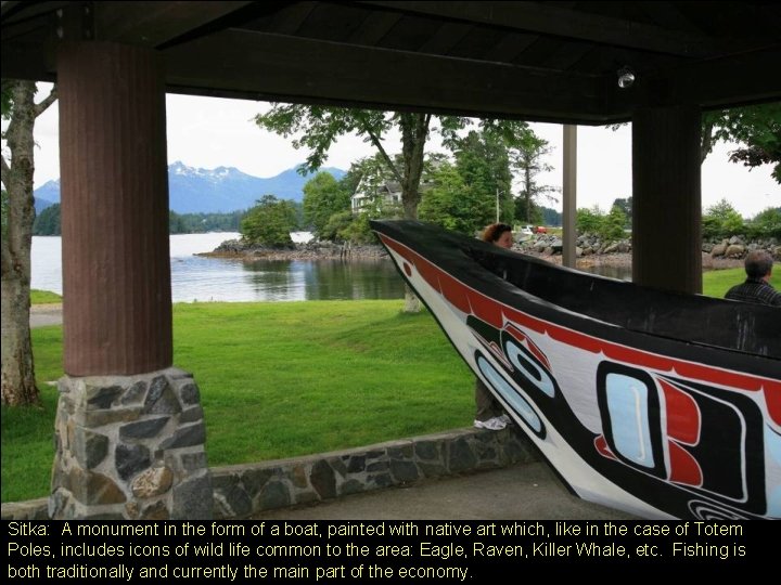 Sitka: A monument in the form of a boat, painted with native art which,