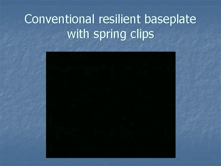 Conventional resilient baseplate with spring clips 
