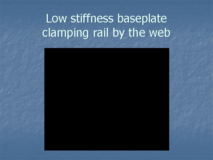 Low stiffness baseplate clamping rail by the web 