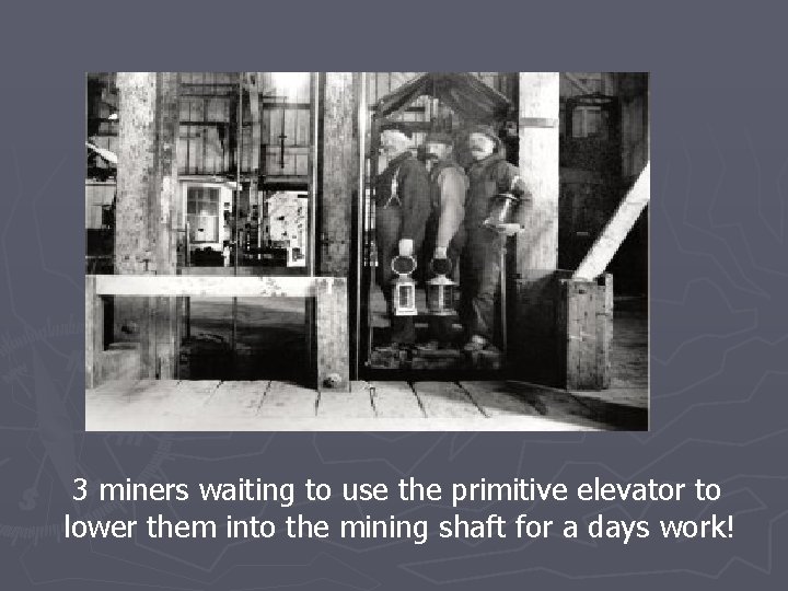 3 miners waiting to use the primitive elevator to lower them into the mining
