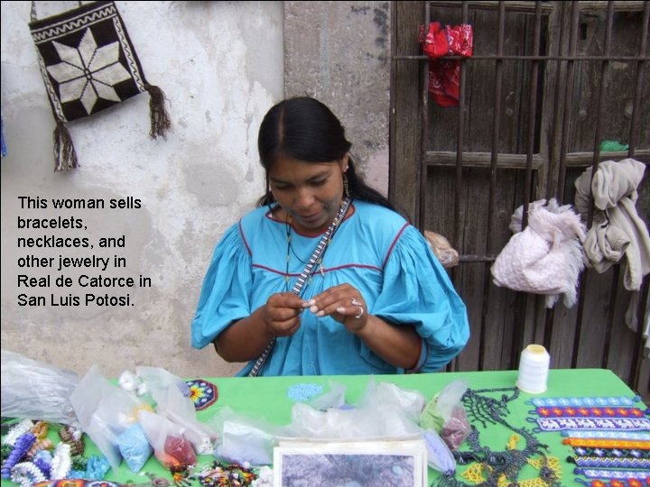 This woman sells bracelets, necklaces, and other jewelry in Real de Catorce in San