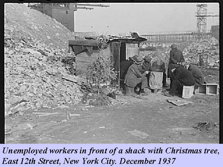 Unemployed workers in front of a shack with Christmas tree, East 12 th Street,