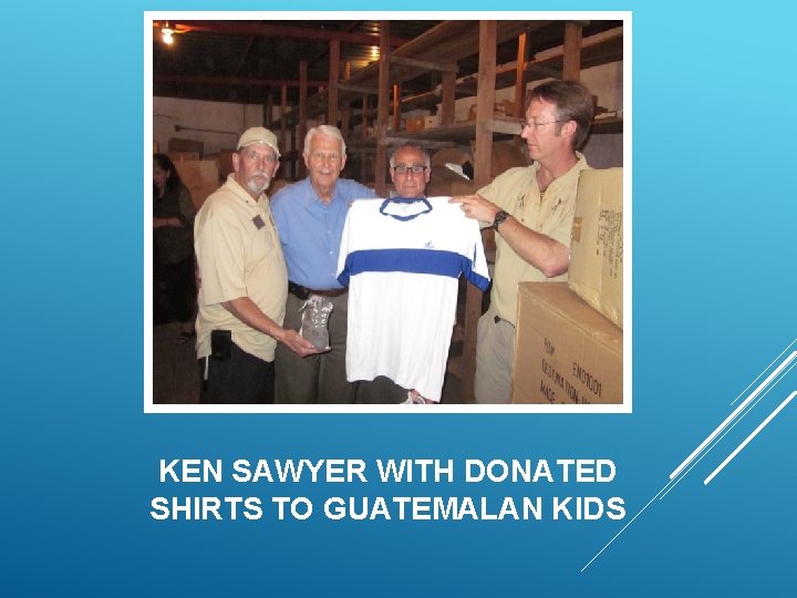 KEN SAWYER WITH DONATED SHIRTS TO GUATEMALAN KIDS 