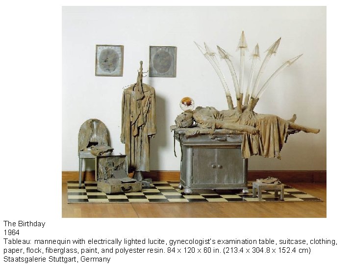 The Birthday 1964 Tableau: mannequin with electrically lighted lucite, gynecologist’s examination table, suitcase, clothing,