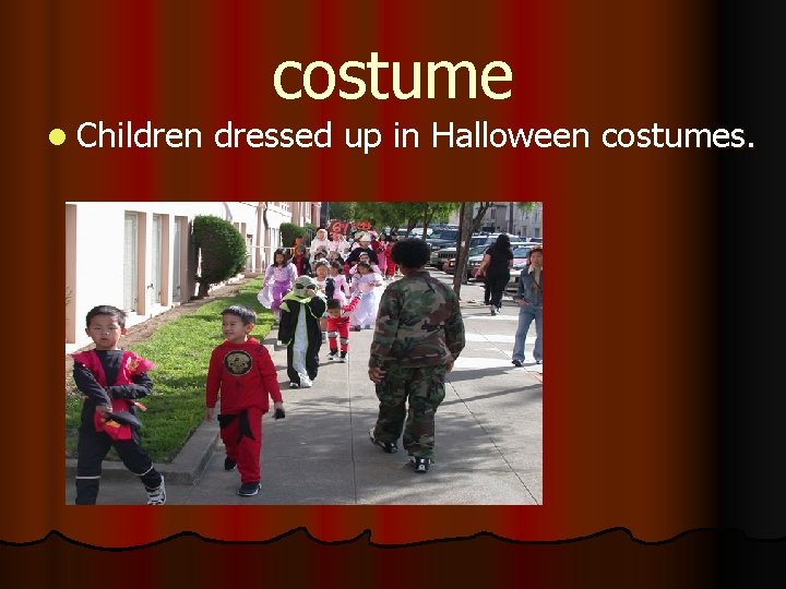 l Children costume dressed up in Halloween costumes. 