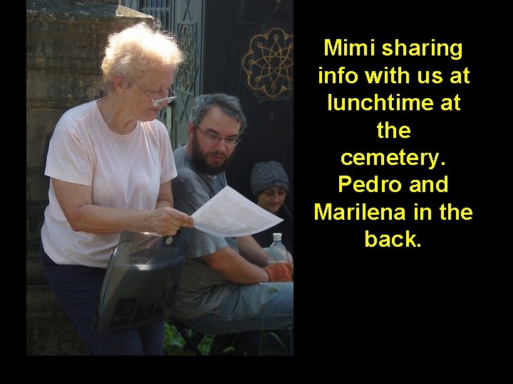 Mimi sharing info with us at lunchtime at the cemetery. Pedro and Marilena in