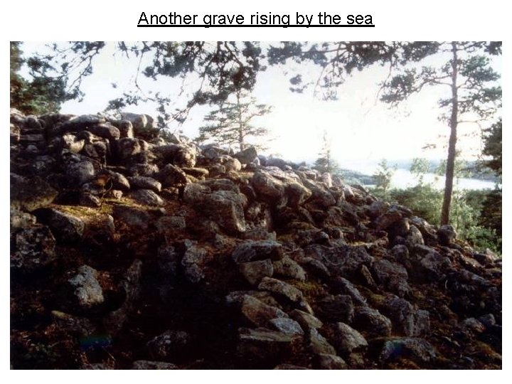 Another grave rising by the sea 