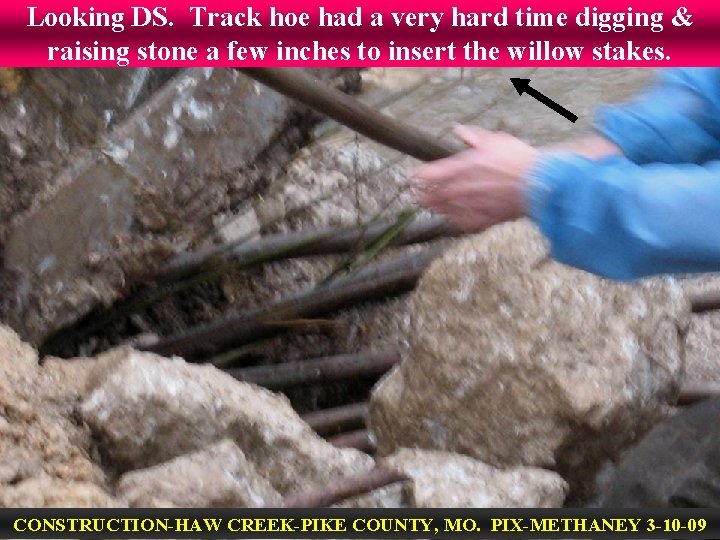 Looking DS. Track hoe had a very hard time digging & raising stone a