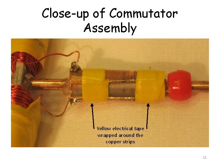 Close-up of Commutator Assembly Yellow electrical tape wrapped around the copper strips 11 