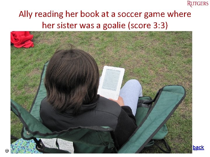 Ally reading her book at a soccer game where her sister was a goalie