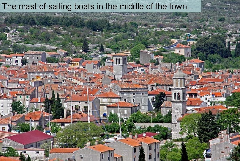 The mast of sailing boats in the middle of the town. . . 