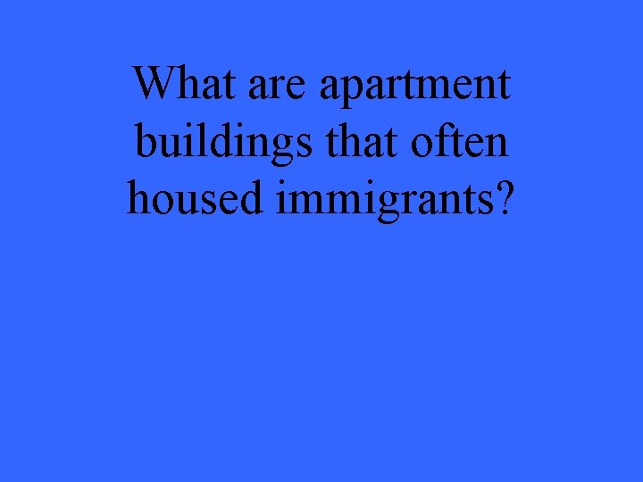 What are apartment buildings that often housed immigrants? 