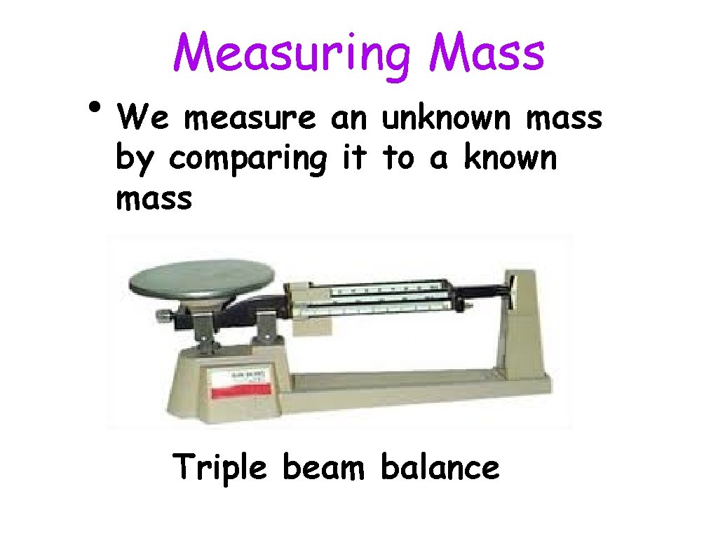 Measuring Mass • We measure an unknown mass by comparing it to a known