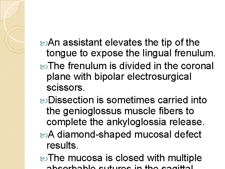  An assistant elevates the tip of the tongue to expose the lingual frenulum.