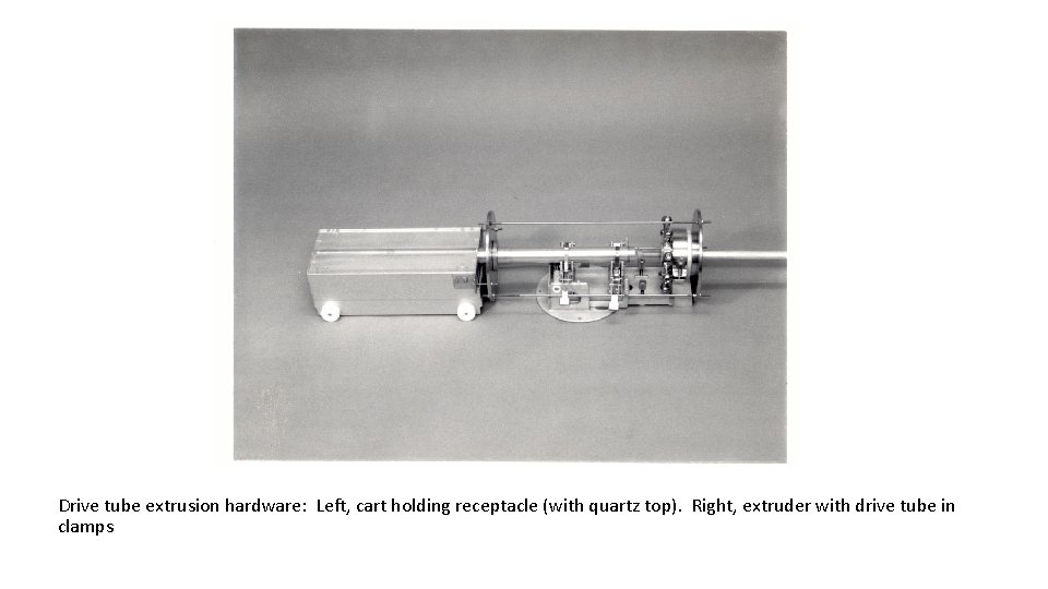 Drive tube extrusion hardware: Left, cart holding receptacle (with quartz top). Right, extruder with