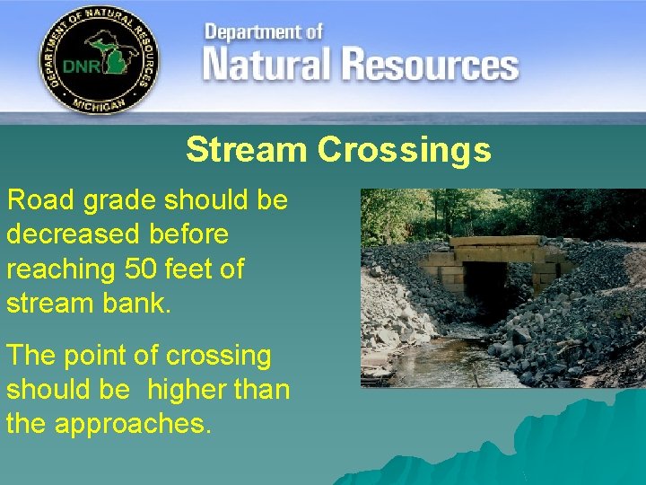 Stream Crossings Road grade should be decreased before reaching 50 feet of stream bank.