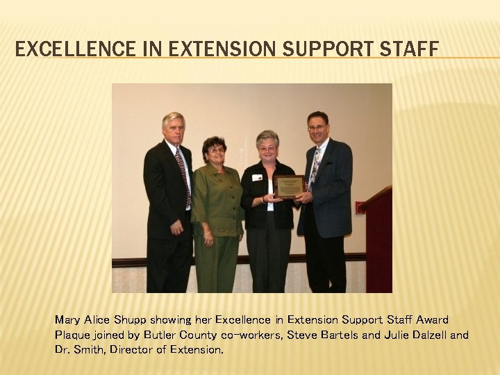 EXCELLENCE IN EXTENSION SUPPORT STAFF Mary Alice Shupp showing her Excellence in Extension Support