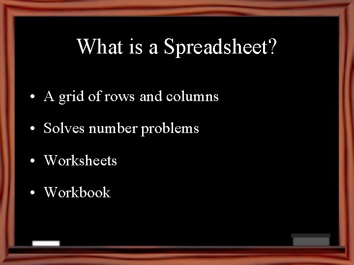 What is a Spreadsheet? • A grid of rows and columns • Solves number