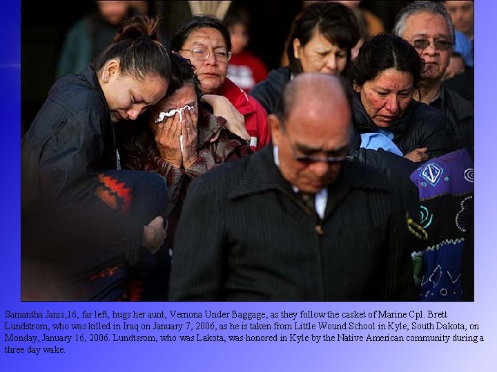 Samantha Janis, 16, far left, hugs her aunt, Vernona Under Baggage, as they follow