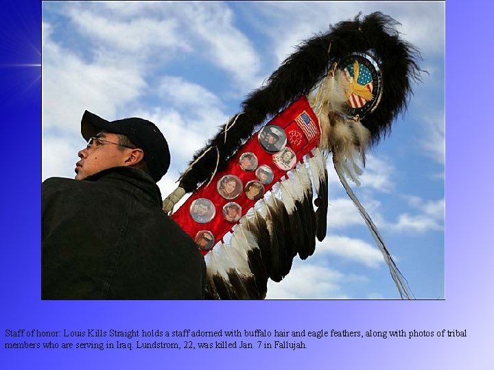 Staff of honor: Louis Kills Straight holds a staff adorned with buffalo hair and