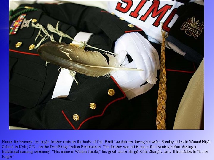 Honor for bravery: An eagle feather rests on the body of Cpl. Brett Lundstrom