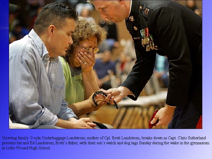 Grieving family: Doyla Underbaggage Lundstrom, mother of Cpl. Brett Lundstrom, breaks down as Capt.