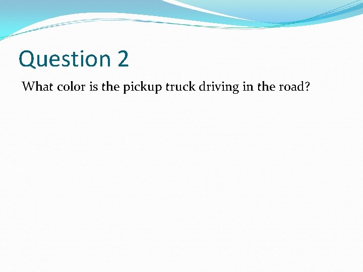 Question 2 What color is the pickup truck driving in the road? 