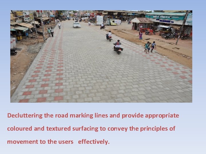 Decluttering the road marking lines and provide appropriate coloured and textured surfacing to convey