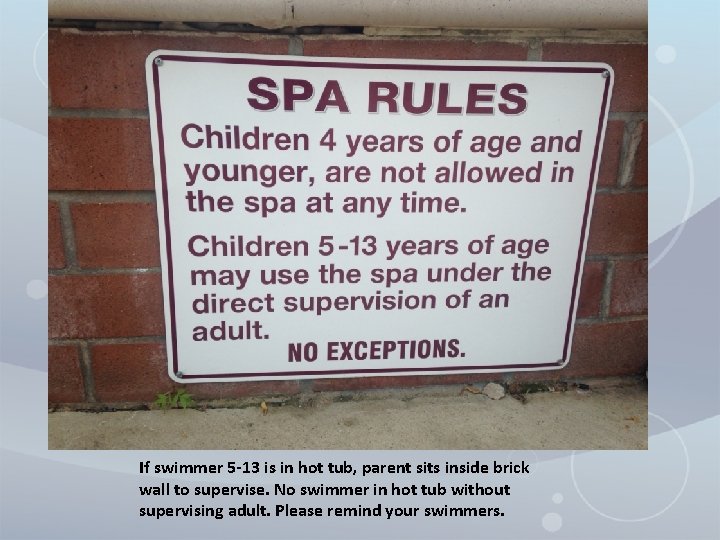 If swimmer 5 -13 is in hot tub, parent sits inside brick wall to