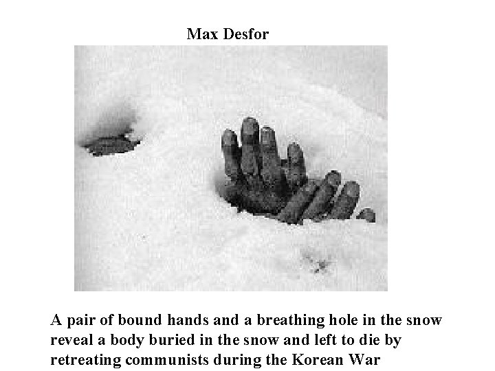 Max Desfor A pair of bound hands and a breathing hole in the snow