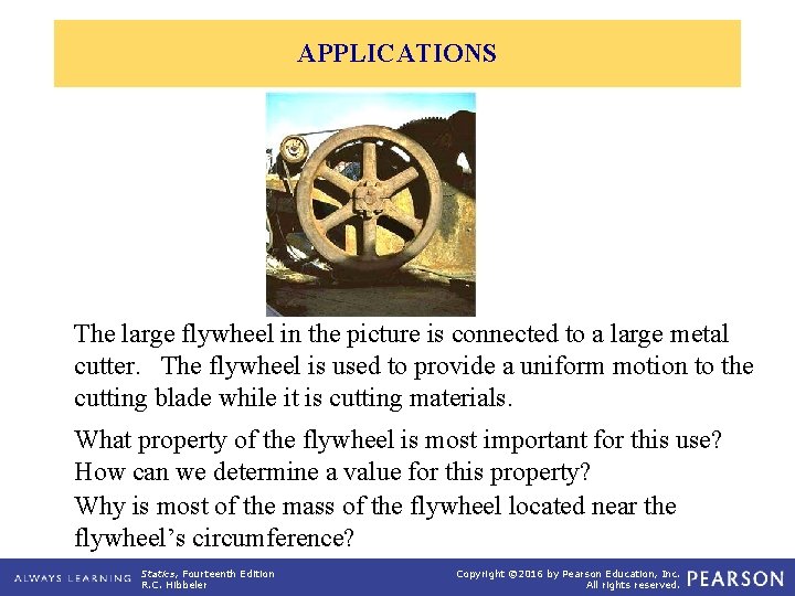 APPLICATIONS The large flywheel in the picture is connected to a large metal cutter.