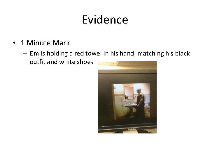 Evidence • 1 Minute Mark – Em is holding a red towel in his